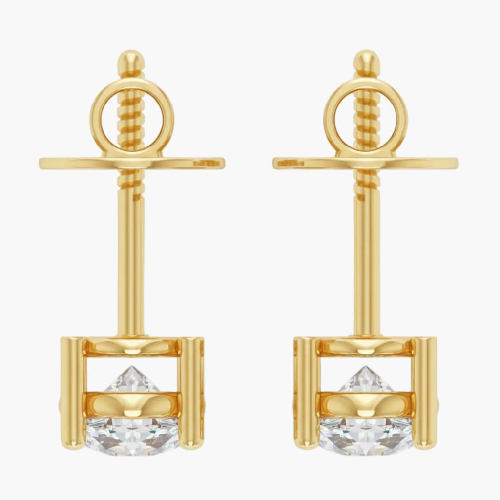 Gold earrings with clear gemstones on a white background