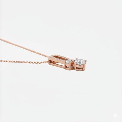 Rose gold necklace with a diamond pendant on a white background