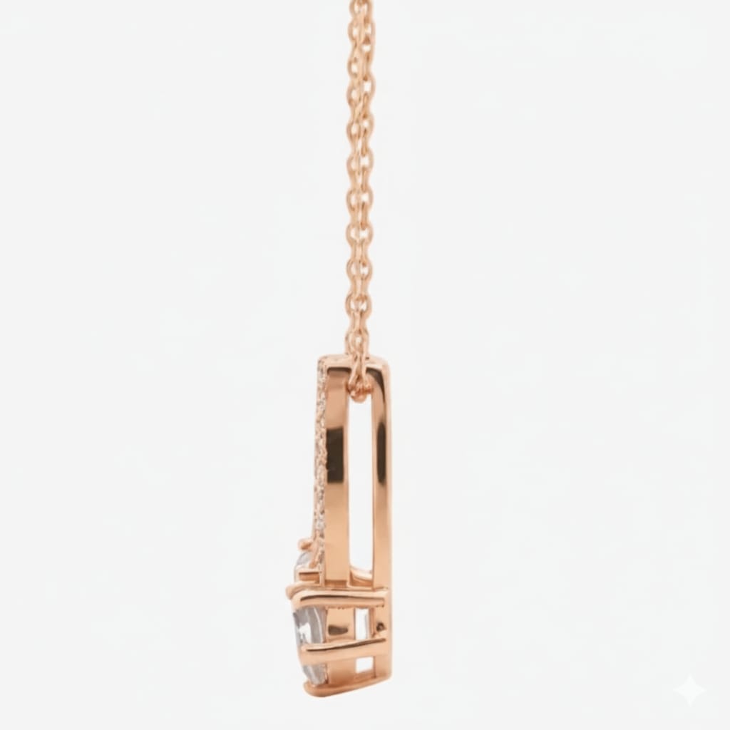 Rose gold necklace with a pendant on a white background