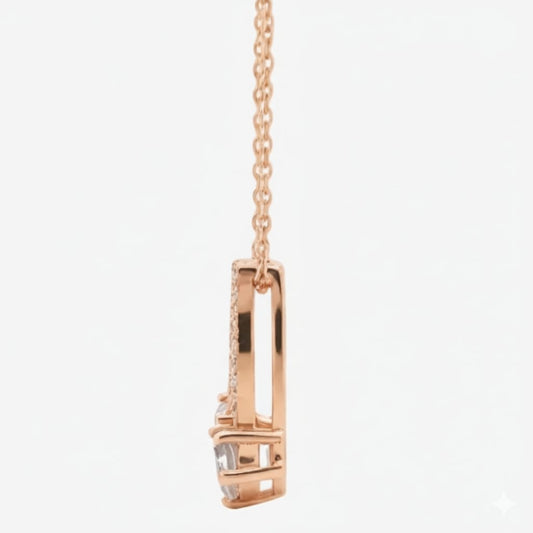 Rose gold necklace with a pendant on a white background