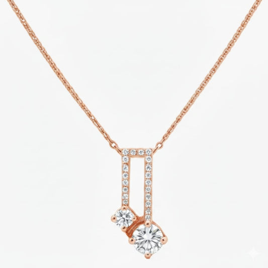 Rose gold necklace with a diamond pendant on a white background