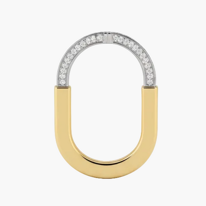 Gold and silver U-shaped ring with diamond accents on a white background