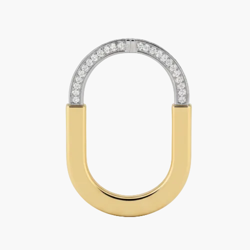 Gold and silver U-shaped ring with diamond accents on a white background