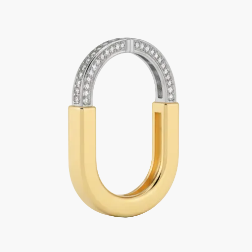 Gold and silver U-shaped ring on a white background