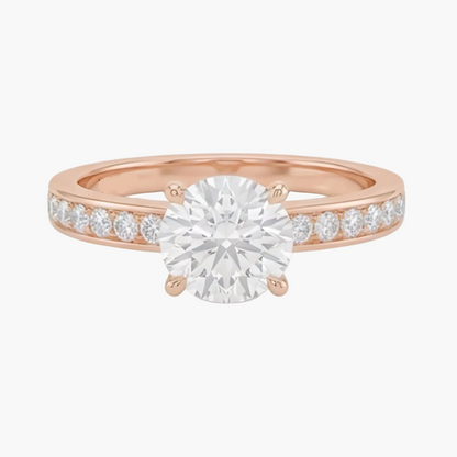 Rose gold ring with a diamond on a light gray background