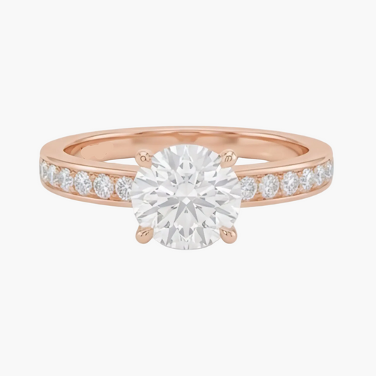 Rose gold ring with a diamond on a light gray background