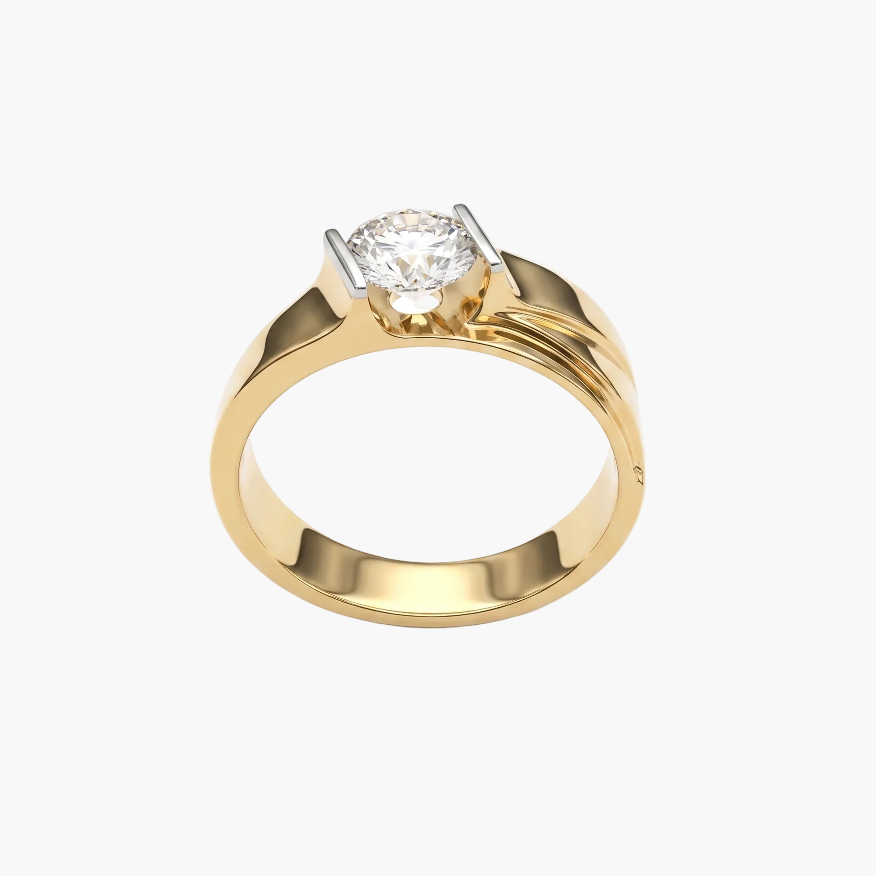 Gold ring with a diamond on a white background