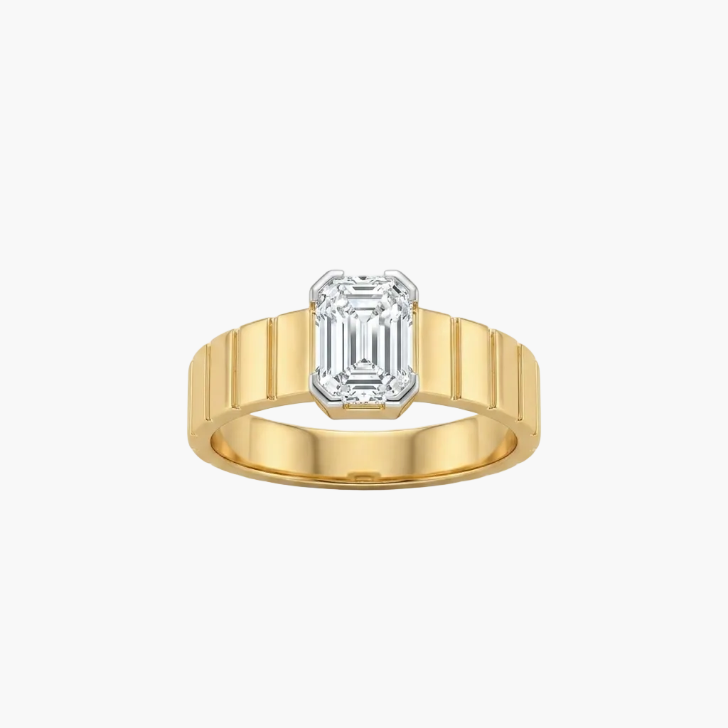Gold ring with a diamond on a white background