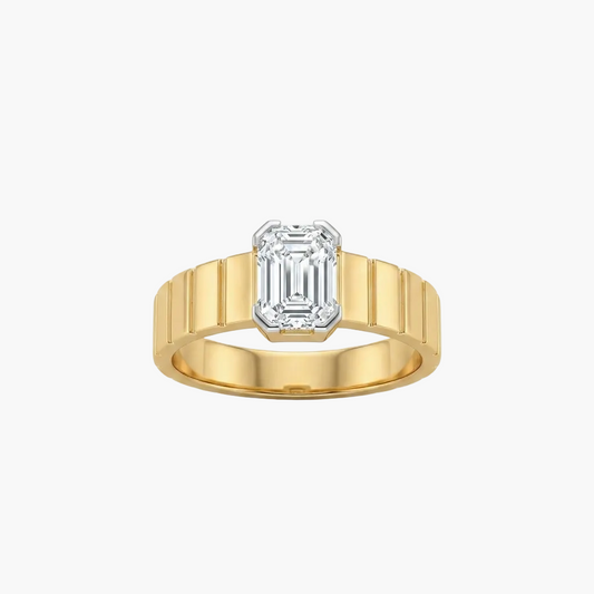 Gold ring with a diamond on a white background