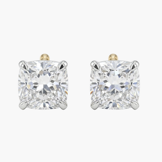 Pair of diamond stud earrings on a white background