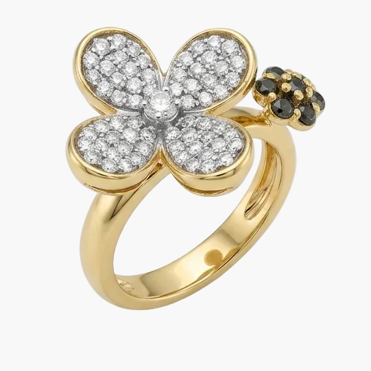 Gold ring with diamond-studded flower design on a white background