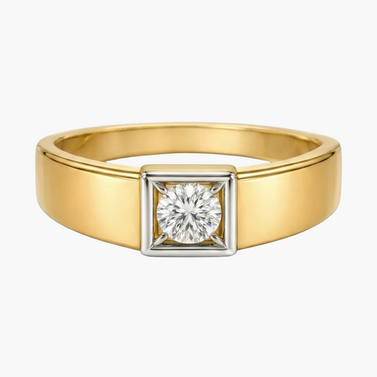 Gold ring with a diamond on a white background