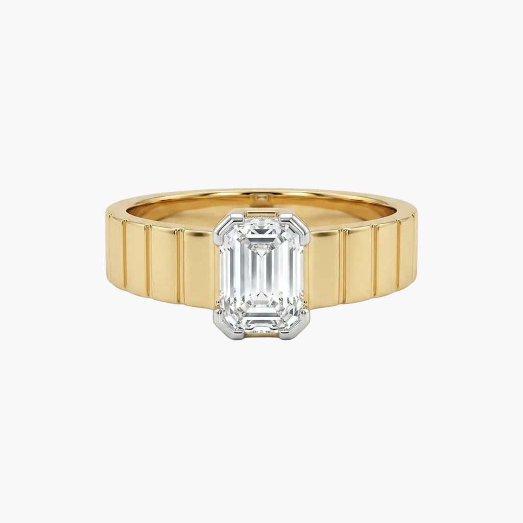Gold ring with a diamond on a white background