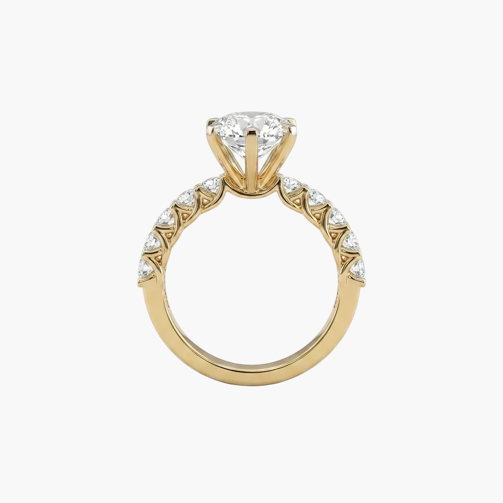 Gold ring with a diamond on a white background