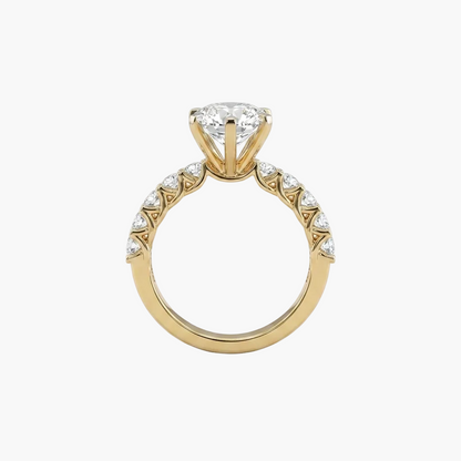 Gold ring with a diamond on a white background