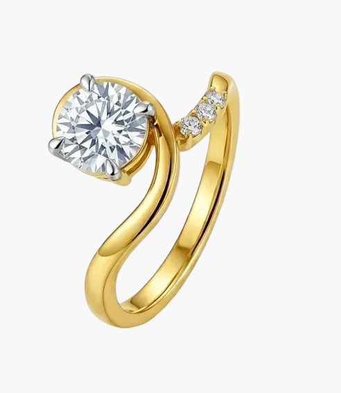 Yellow gold ring with a large diamond and smaller diamonds on the band against a white background.