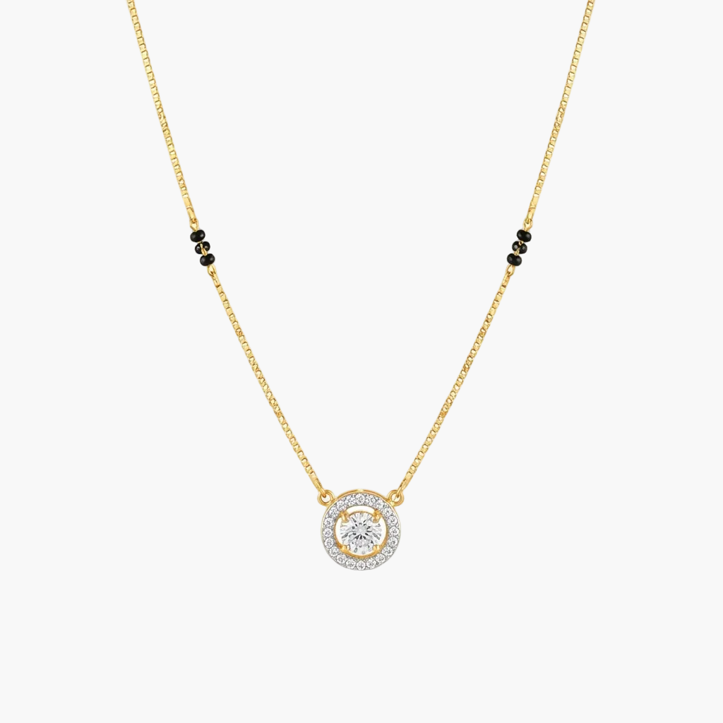 A delicate gold chain necklace featuring a circular pendant with a central clear gemstone surrounded by a halo of small clear stones, accented by three small black beads on each side of the chain, shown on a plain white background.