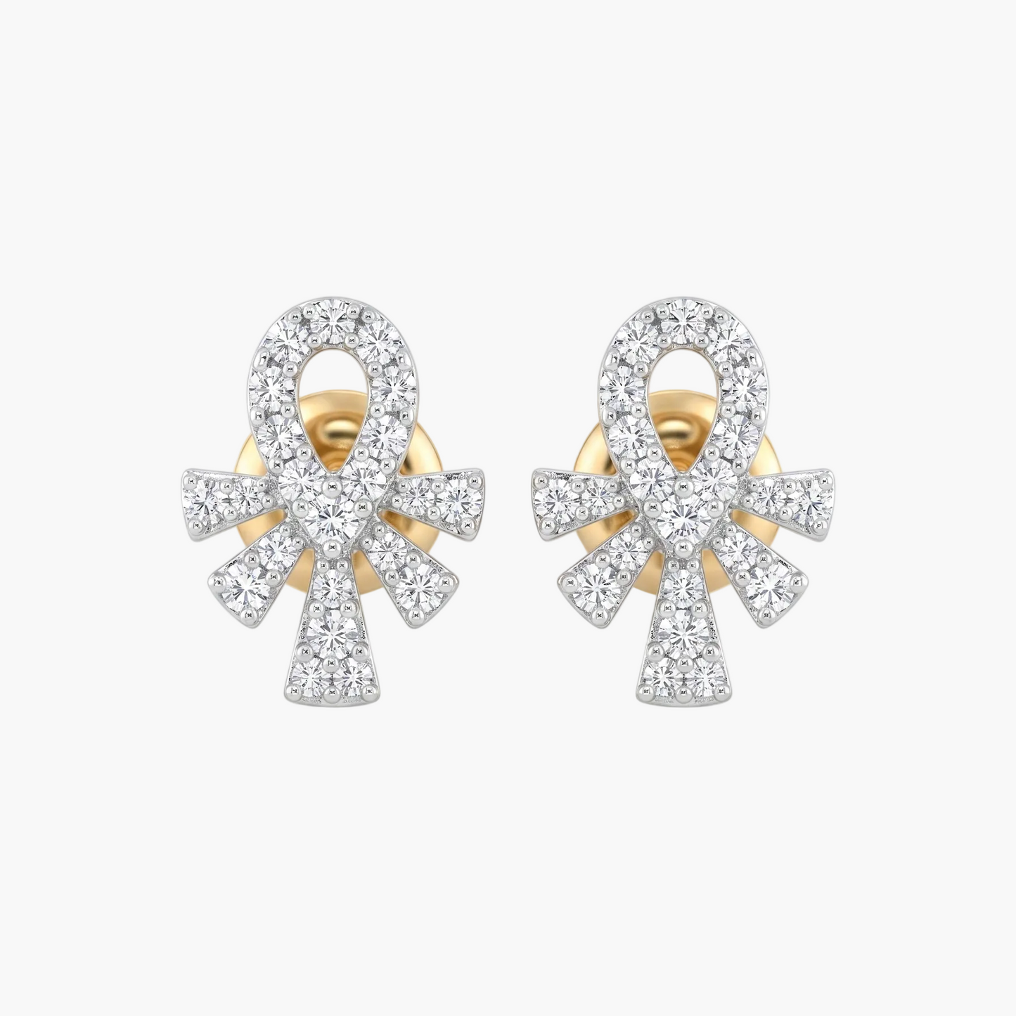 Pair of gold and diamond earrings on a white background