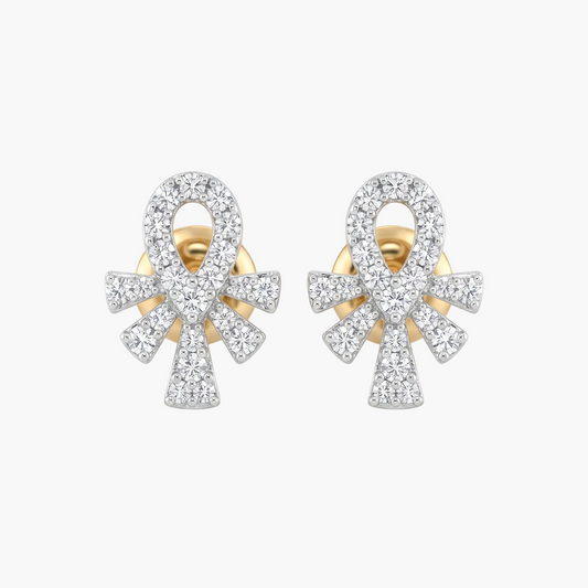 Pair of gold and diamond earrings on a white background