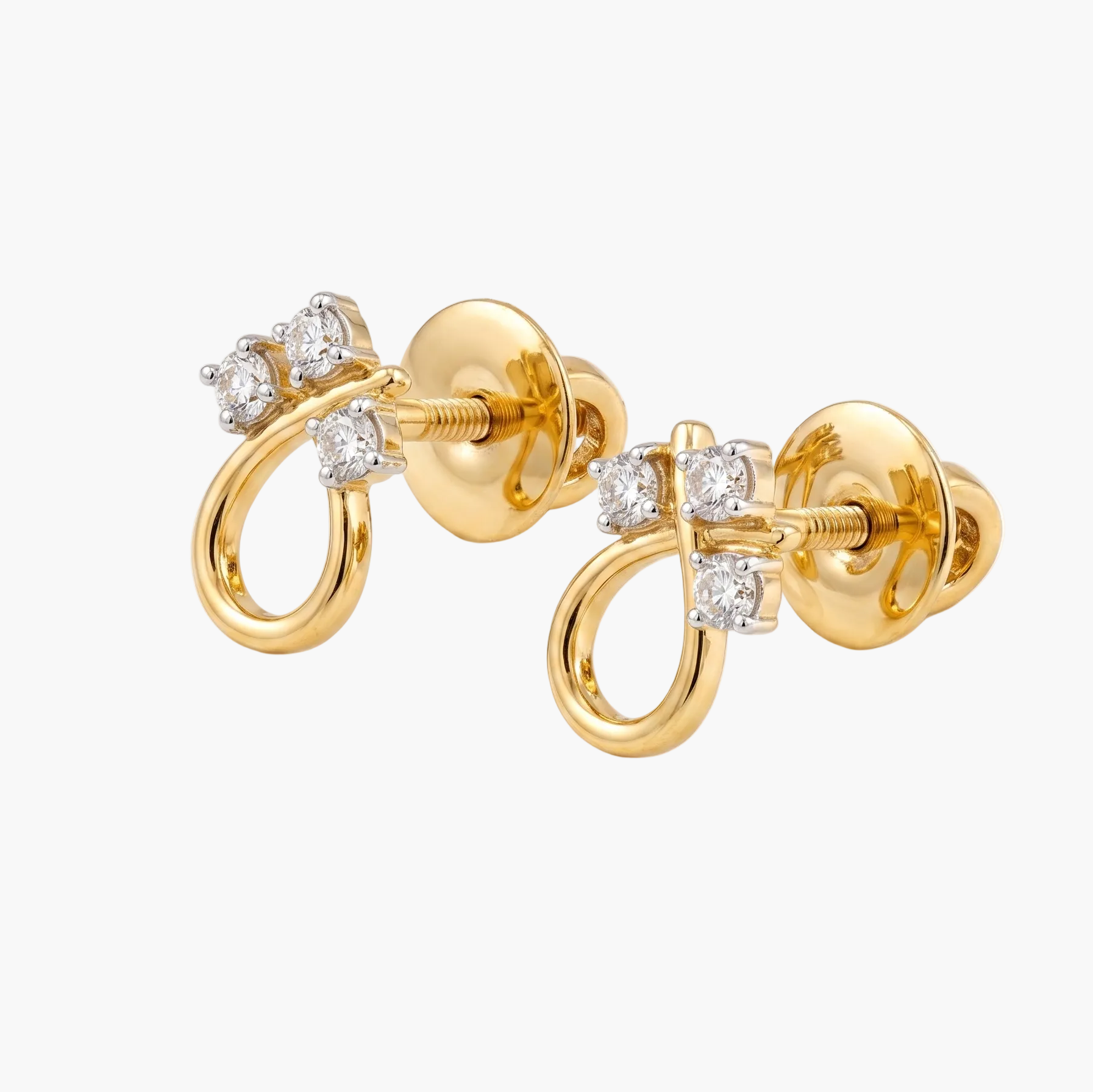 Gold earrings with diamond accents on a white background