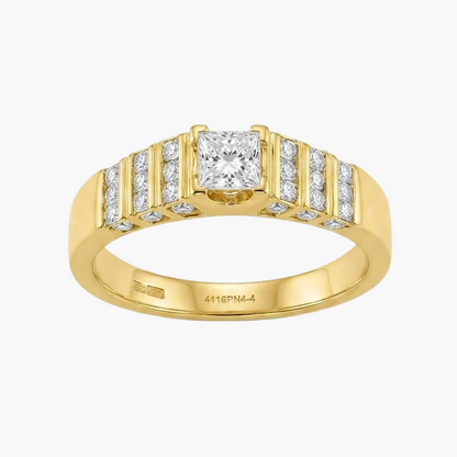 A yellow gold ring featuring a central princess-cut diamond surrounded by channel-set diamonds on a split shank, shown on a plain white background.
