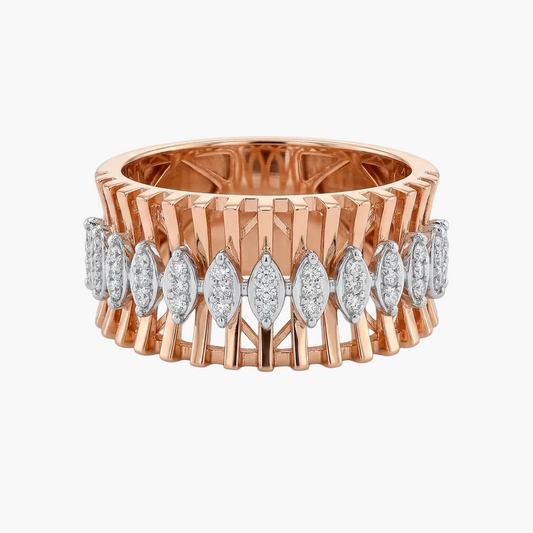 A wide rose gold ring featuring a series of marquise-cut and baguette diamonds set in a geometric, basket-like frame, shown on a light gray background.