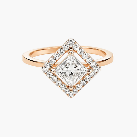 A rose gold diamond ring with a square center stone surrounded by a double halo of small clear stones, set on a plain white background.