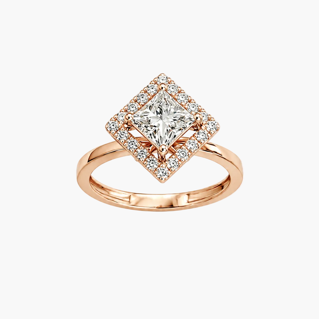 A rose gold diamond ring with a square-shaped halo featuring a central princess-cut diamond surrounded by smaller diamonds, set against a plain white background.