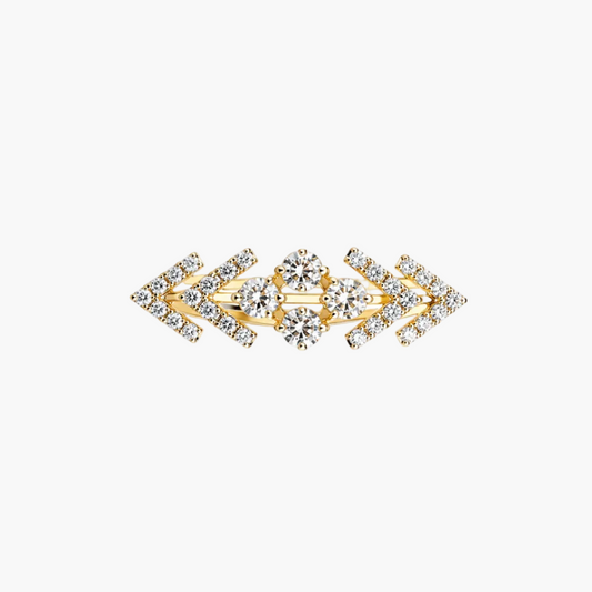A gold geometric earring featuring multiple stacked arrowhead and diamond motifs, set with clear stones on a plain white background.