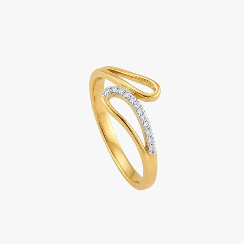 A gold ring with a curved, openwork design featuring a row of small clear stones on one section, shown on a plain white background.