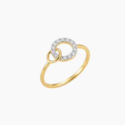 A gold ring featuring two interlocking circular elements, with the larger ring encrusted with small clear stones, shown on a clean white background.