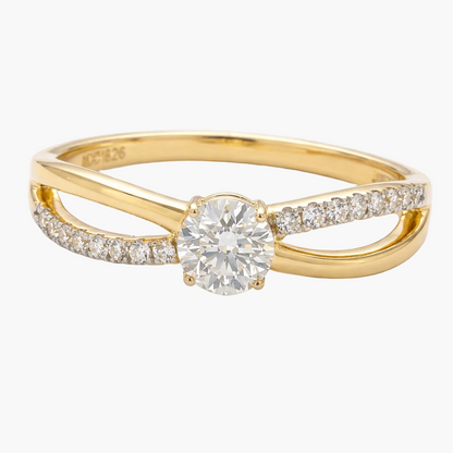 Gold ring with a diamond on a white background