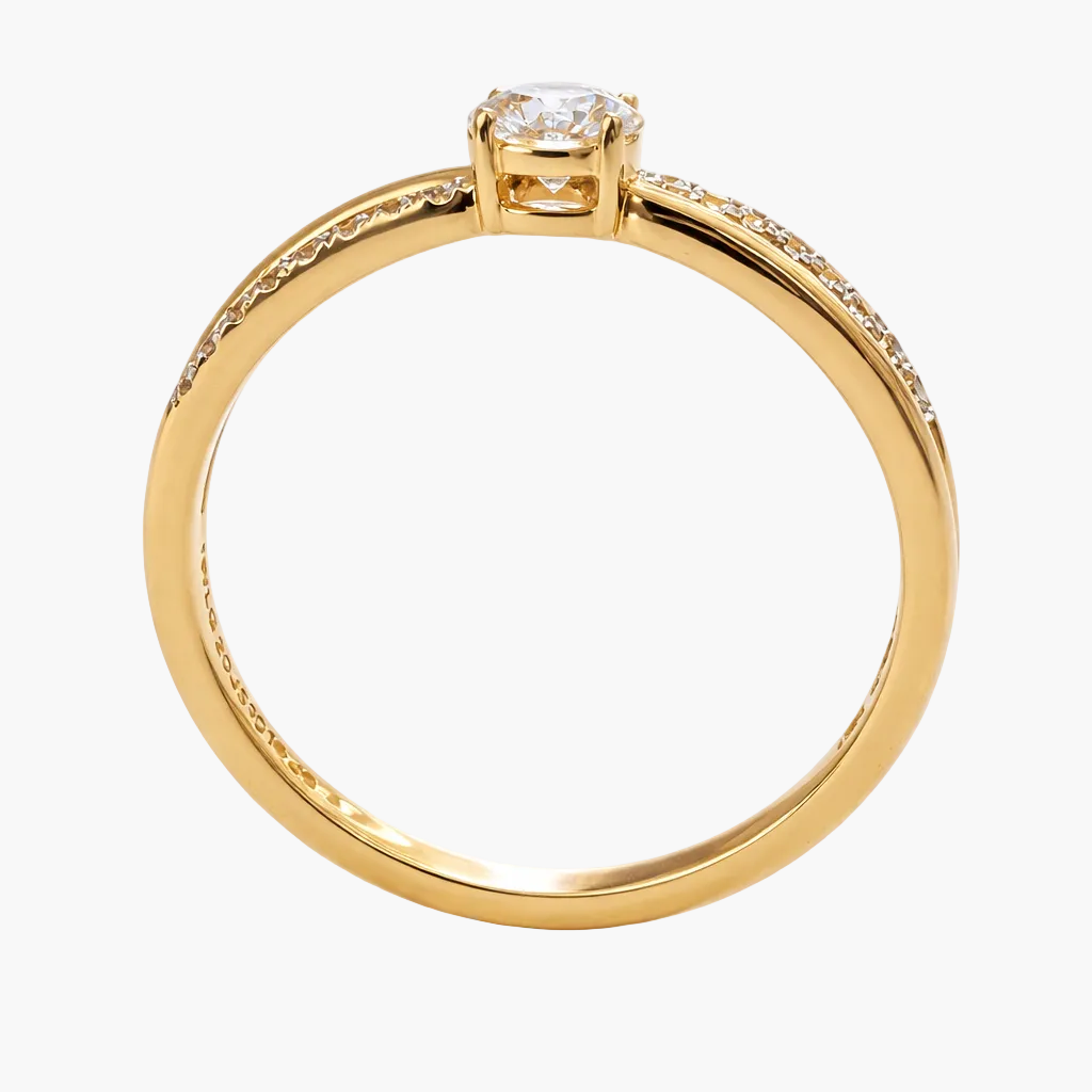 Gold ring with a diamond on a white background