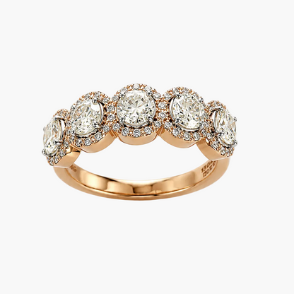Rose gold ring with multiple diamonds on a white background