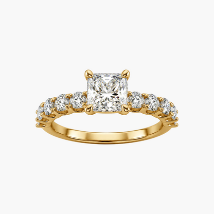 Gold ring with a central diamond and smaller diamonds on a white background