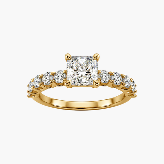 Gold ring with a central diamond and smaller diamonds on a white background