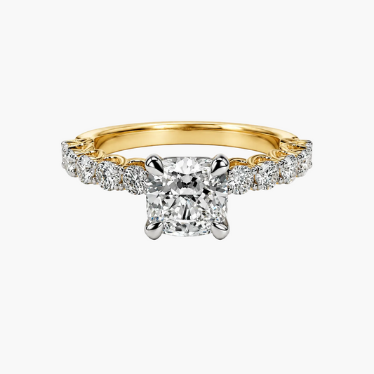 Gold ring with a diamond on a white background
