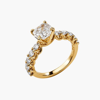Gold ring with a diamond on a white background