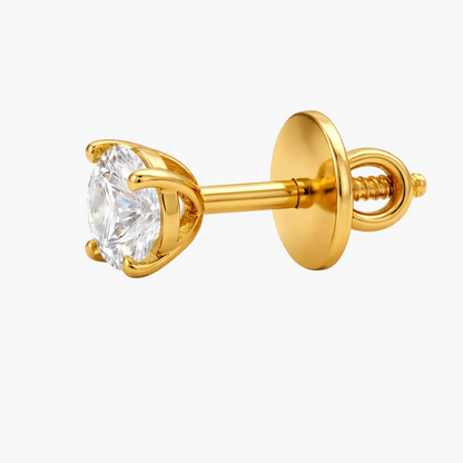 Gold earring with a clear gemstone on a white background