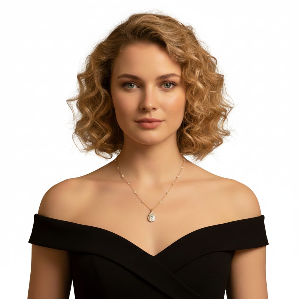 Woman wearing a black off-shoulder top and a necklace with a pendant on a white background