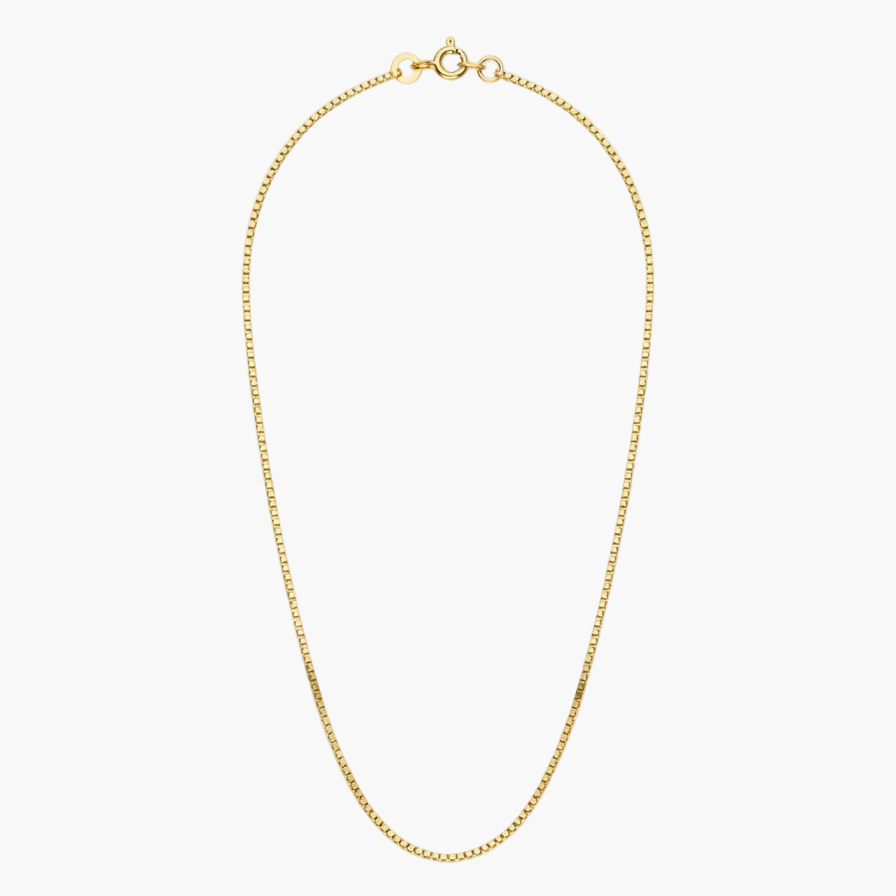 A delicate yellow gold chain necklace with a small clasp, displayed in a curved loop shape against a clean white background with a soft shadow underneath.