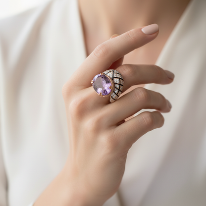 Female model wearing amethyst diamond cocktail ring