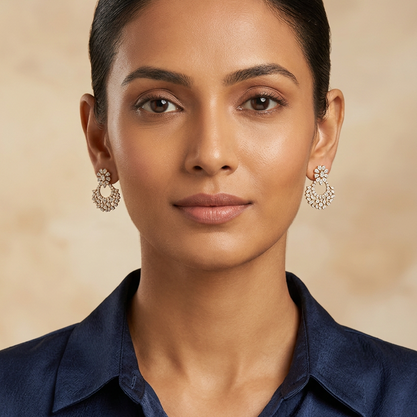 Female model wearing both earrings at a very small, delicate scale