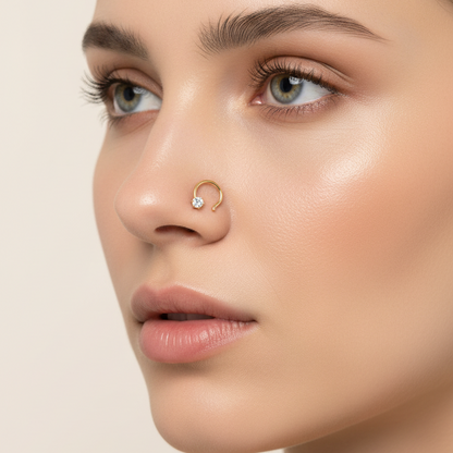Female model wearing classic diamond nose pin