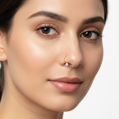 Female model wearing delicate diamond nose pin
