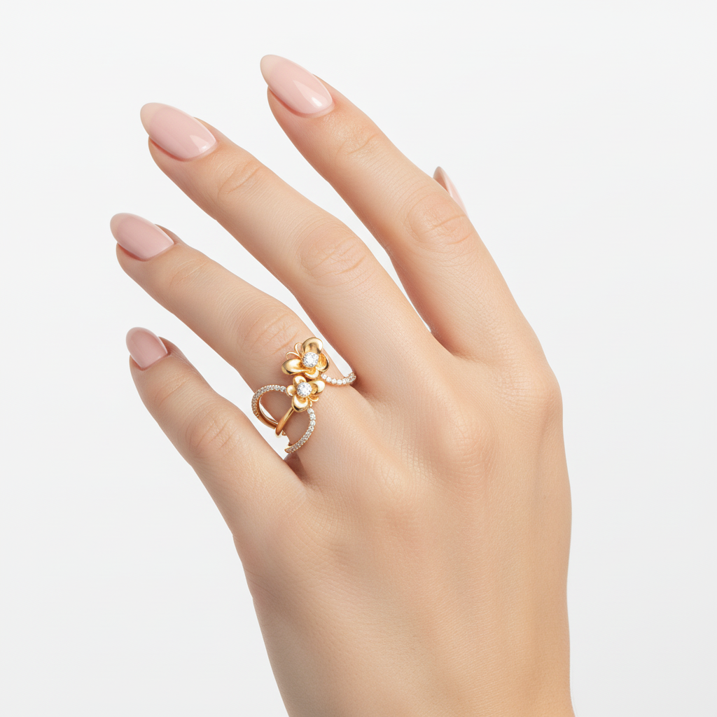 Female model wearing delicate gold floral diamond ring