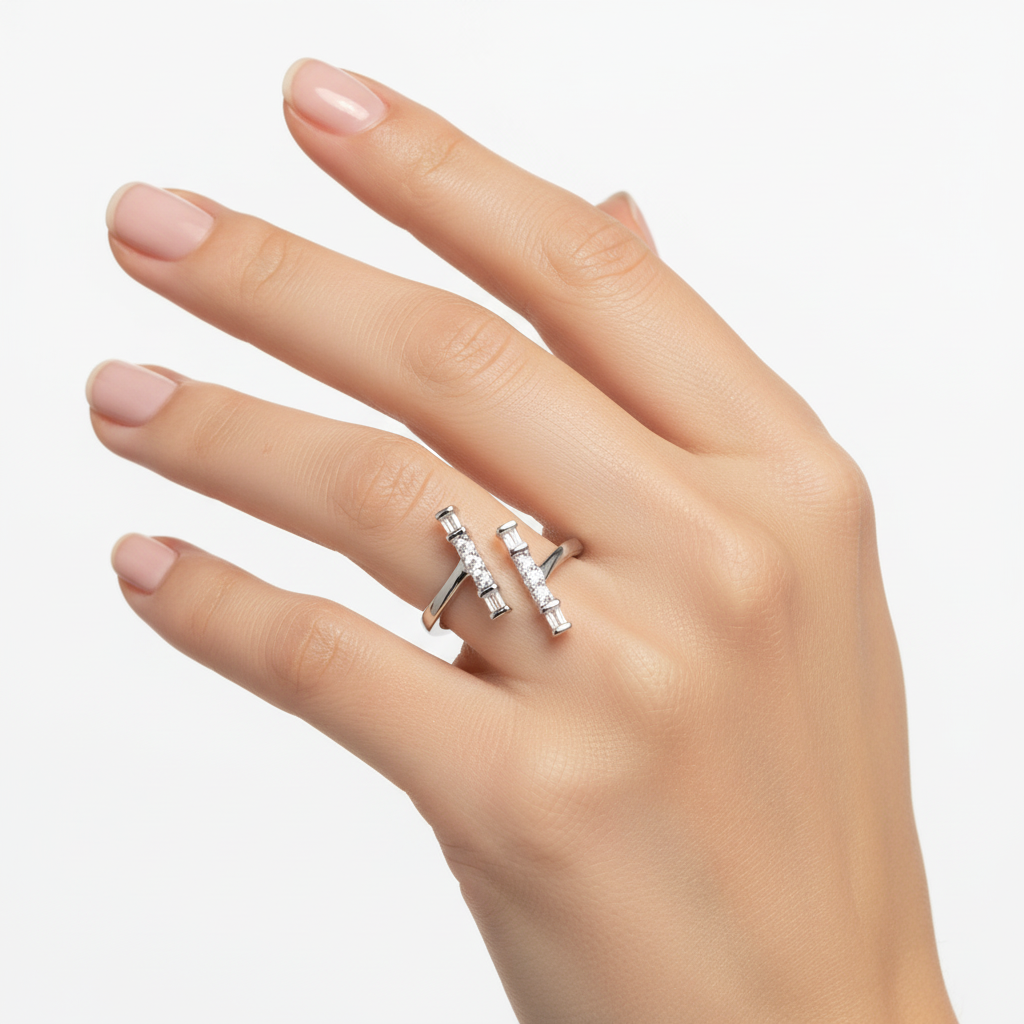 Female model wearing delicate modern diamond ring