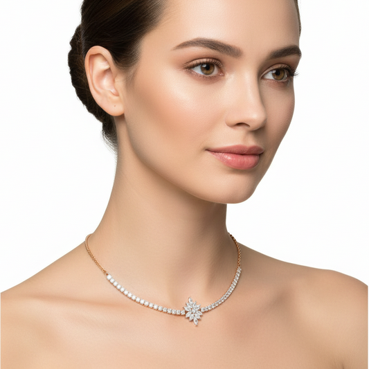 Female model wearing delicate two-tone gold diamond choker with starburst pendant