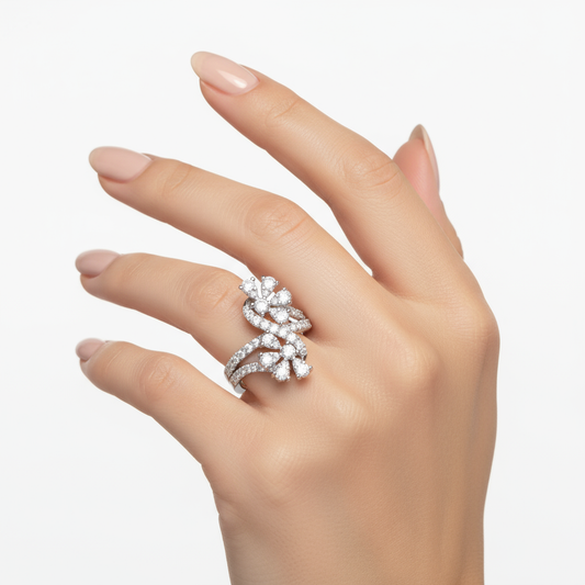 Female model wearing delicate white gold floral diamond ring