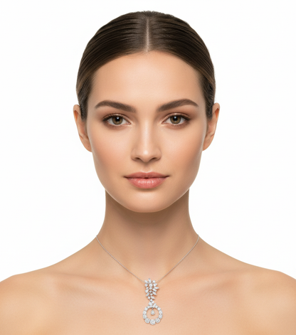 Female model wearing delicate white gold mixed-cut diamond pendant